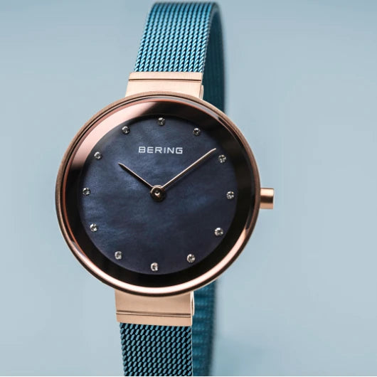 Bering | Classic Rose Gold blue 28mm dial milanese strap | 10128-368