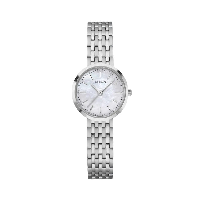 A polished silver Bering watch with a mother of pearl dial and a stainless steel bracelet.
