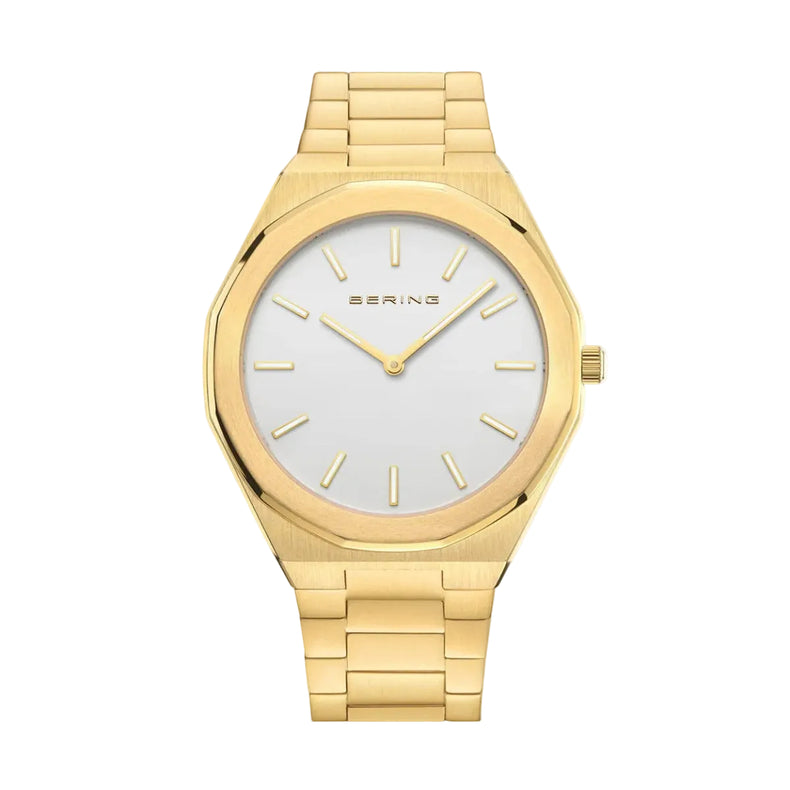 A polished gold Bering watch with a 41mm silver dial and a gold bracelet.