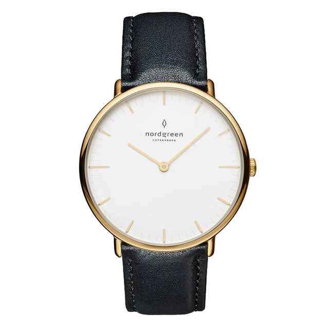 A women's watch with a white dial and black leather strap, featuring a gold PVD finish and the Nordgreen brand name.