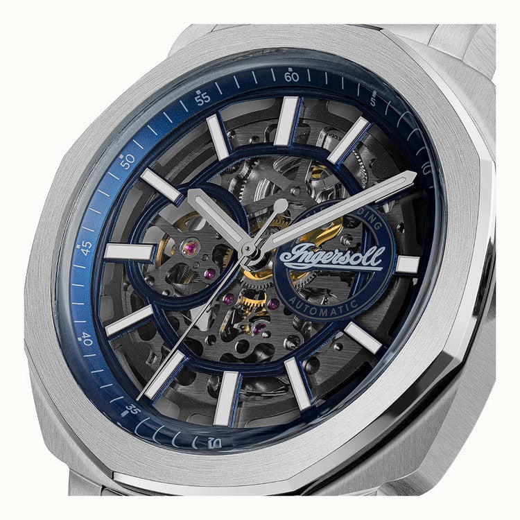 Watch with visible mechanical components and Ingersoll branding on a white background