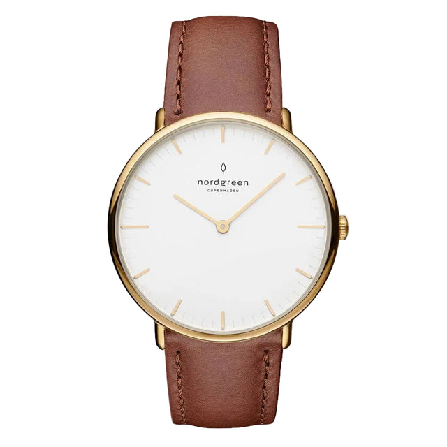 A women's watch with a white dial and brown leather strap, featuring a gold PVD finish and the Nordgreen brand logo.