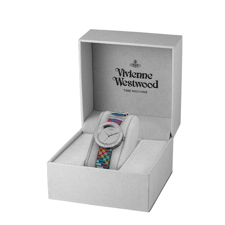 A Vivienne Westwood Time Machine watch with a colorful woven strap and silver-toned round dial, presented inside its light gray branded gift box.