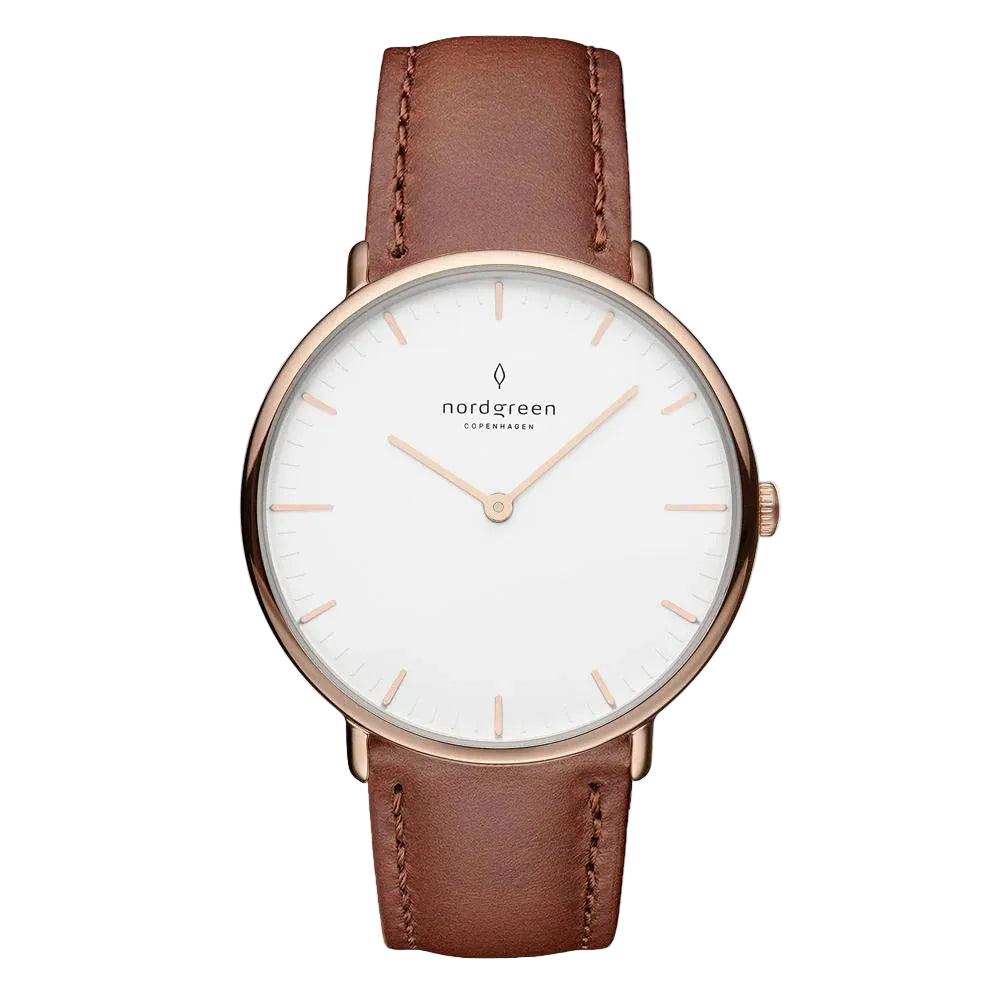 A rose gold-colored watch with a white dial and a brown leather strap, featuring markings and a logo on the face.