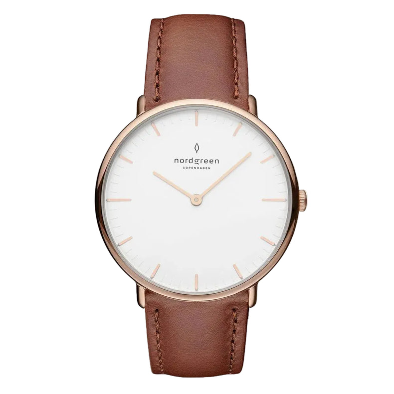 A rose gold-colored watch with a white dial and a brown leather strap, featuring markings and a logo on the face.