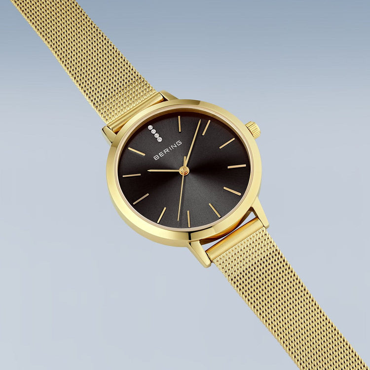 Bering | Classic gold 34mm black dial gold mesh strap | 13434-332