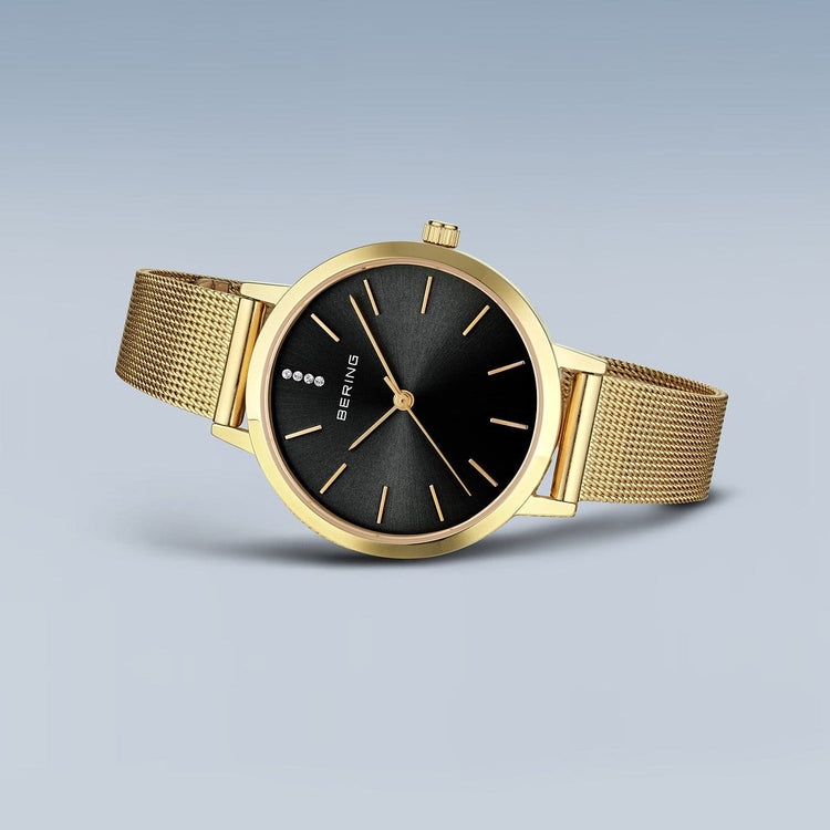 Bering | Classic gold 34mm black dial gold mesh strap | 13434-332
