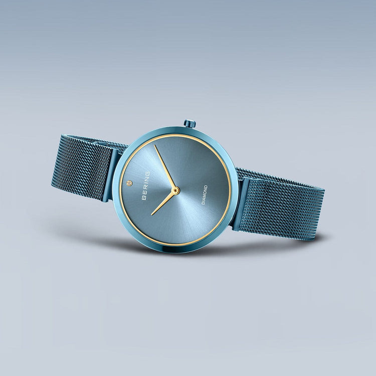 Bering | Charity blue 32mm dial blue milanese strap | 18132-Charity1