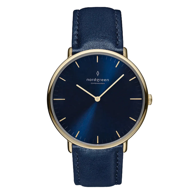A women's watch with a blue dial and a gold PVD finish, featuring a classic design with a black leather strap.