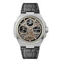 Luxury watch with black leather strap and intricate face on a white background