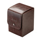 Brown leather jewelry box with a visible brand logo on a white background