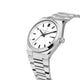 Silver watch with a white face on a light gray background