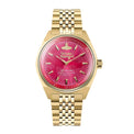 A gold-tone wristwatch with a vibrant magenta-pink dial and matching pink accents, featuring a gold-tone link bracelet and gold-tone case, photographed against a light gray background.