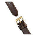 Brown leather watch strap with gold buckle on a white background