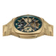 Gold wristwatch with intricate design on a white background