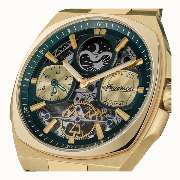 Gold wristwatch with intricate design and visible brand name on a white background