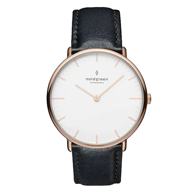 A women's watch with a rose gold PVD finish and a black leather strap, featuring a white dial with clear markings and the Nordgreen brand name.
