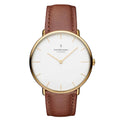 A women's watch with a white dial and brown leather strap, featuring a gold PVD finish and the Nordgreen brand logo.