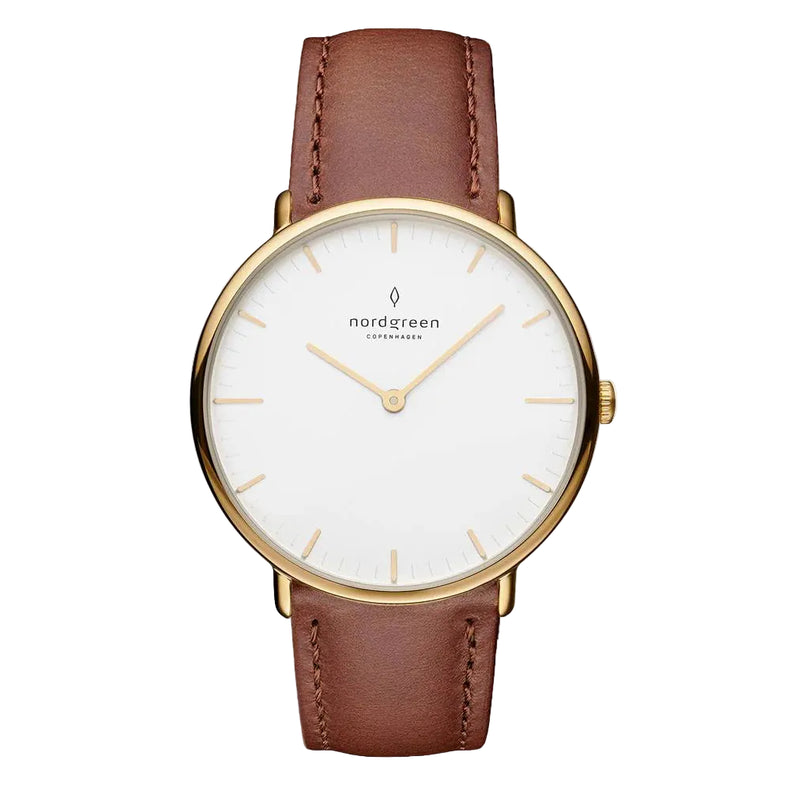 A women's watch with a white dial and brown leather strap, featuring a gold PVD finish and the Nordgreen brand logo.