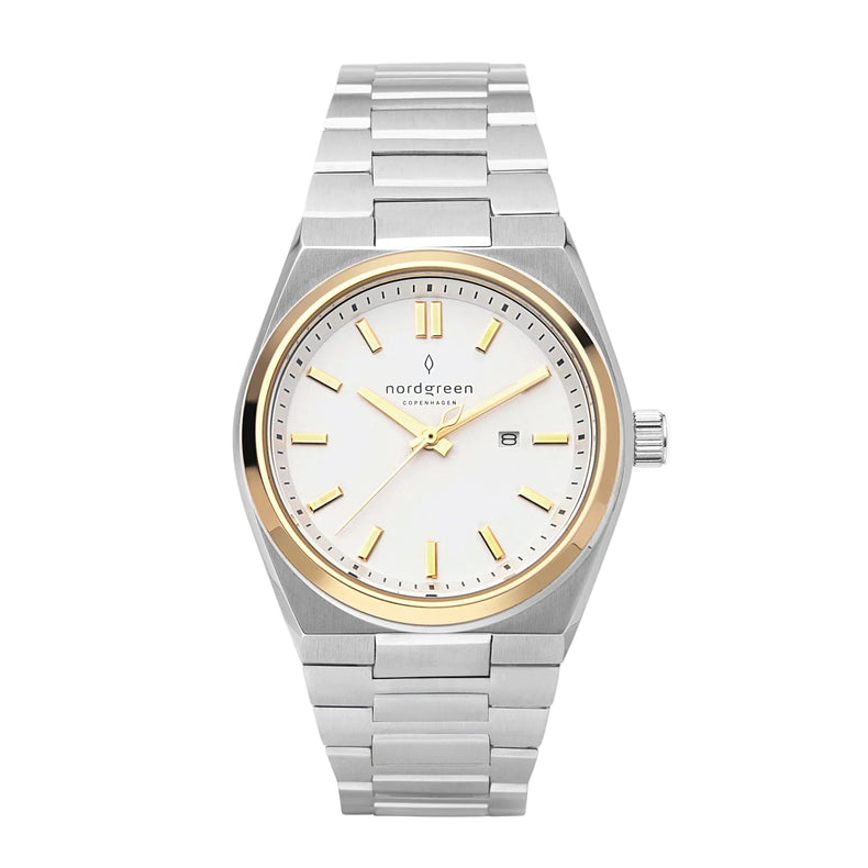 Silver and gold watch with a white face on a light gray background