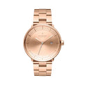 A rose gold-toned Nordgreen watch with a 40mm dial, three-link chain, and a date window.