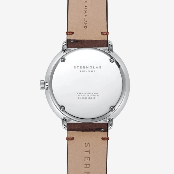 Stern Glas watch with black strap and visible brand name on a white background