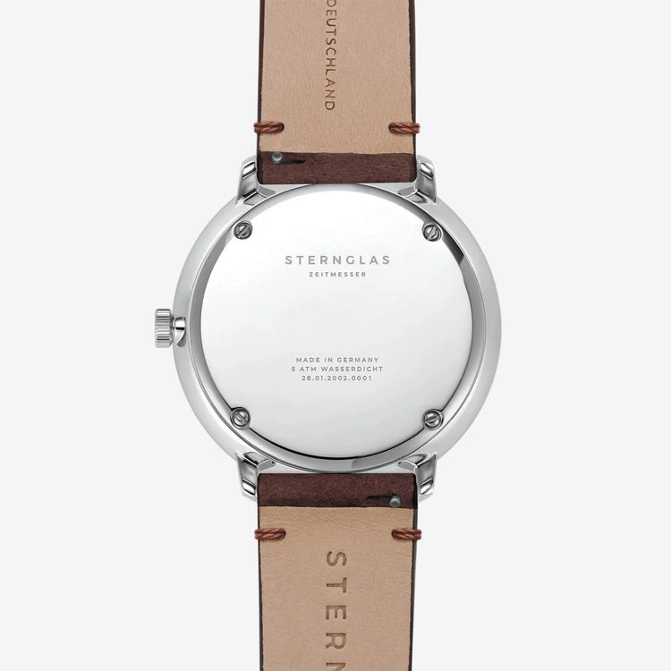 Stern Glas watch with black strap and visible brand name on a white background