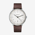 Sternglas watch with a brown leather strap, silver-toned case, and a white dial with black markings and hands, shown against a plain white background.